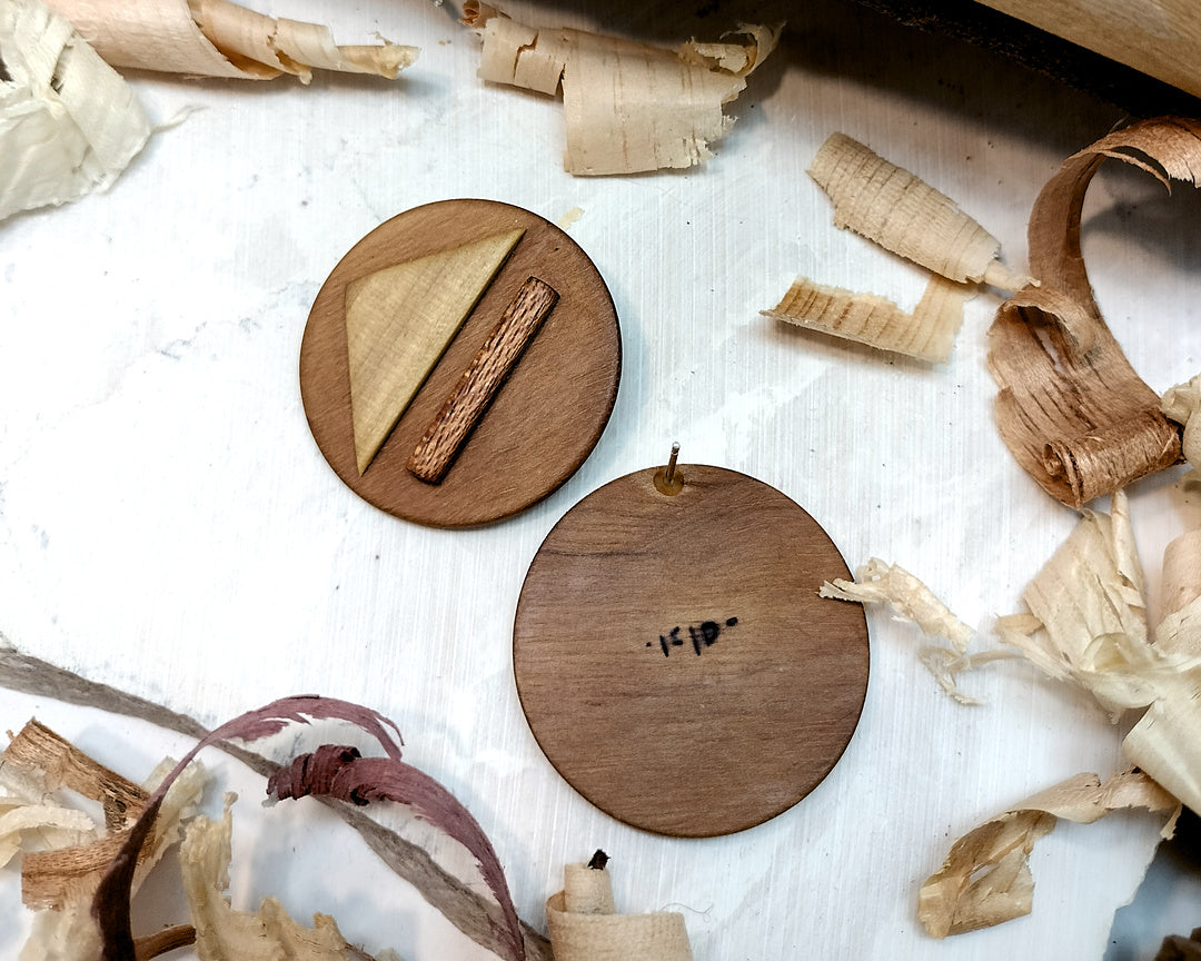 Round stud earrings "Play - Pause" from Walnut, Meranti and Zebrano wood