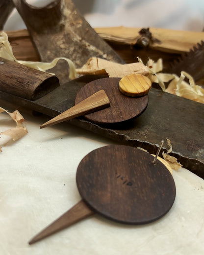 Round stud earrings "The Exclamation" from Iroko, Eycalyptus and Pine wood